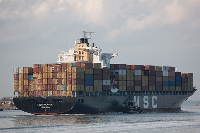 A barge with shipping containers