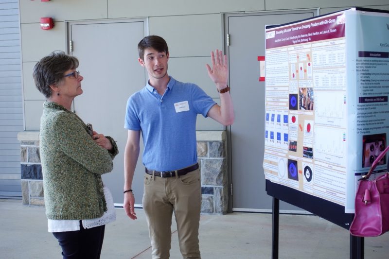 FST undergrad Jakob Baker explains his research to a judge