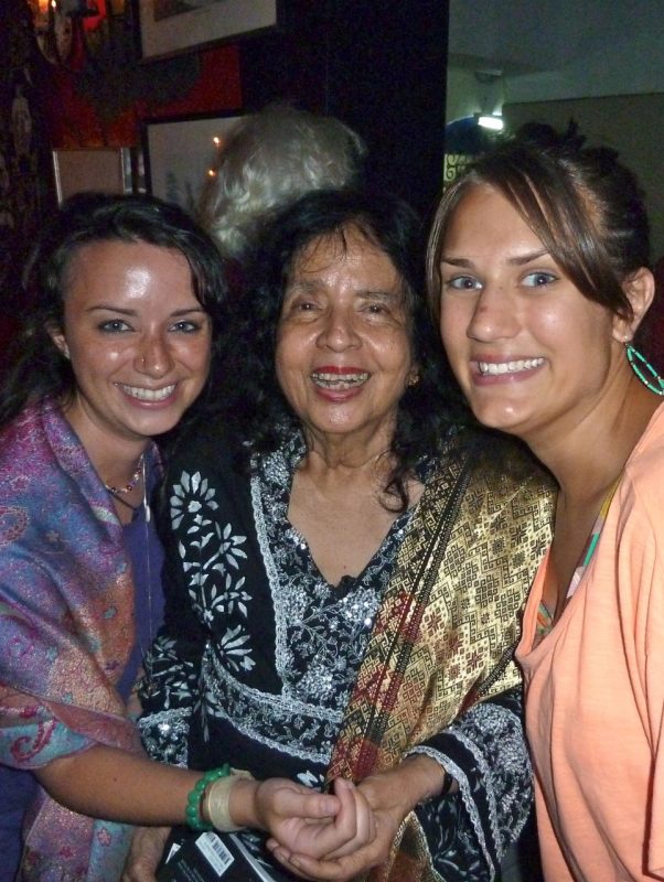 Jean Arasanayagam flanked by Virginia Tech students