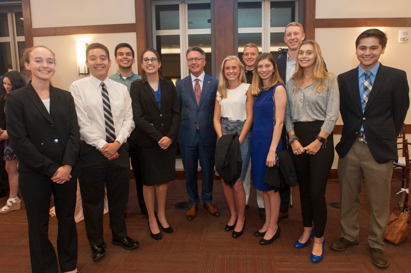 President Tim Sands with recipients of the Beyond Boundaries scholarship.