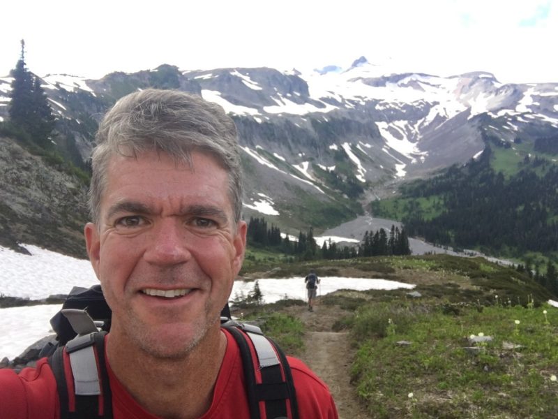 Rob Bohall '91 pictured backpacking at Mt. Ranier.