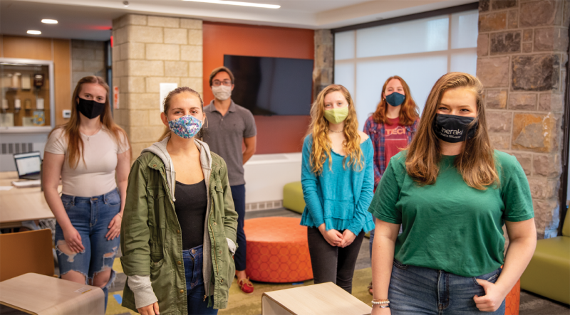 Students in the Meraki living-learning community take a break from studying in the Payne Hall lounge. 