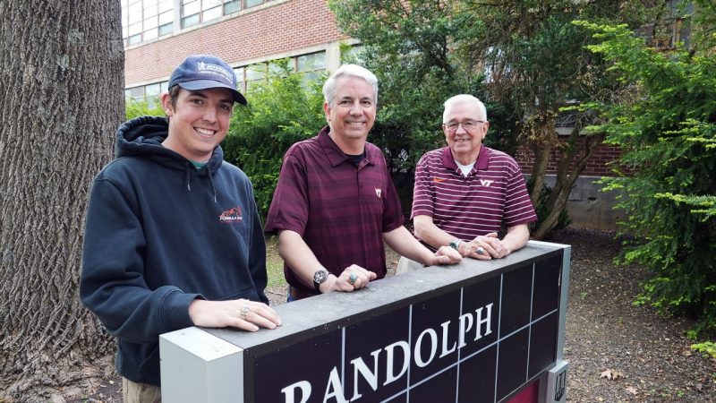 (From left) John Bobbitt IV, John Bobbitt III, and John Bobbitt II convene outside Randolph Hall. Photo by Alex Parrish for Virginia Tech.